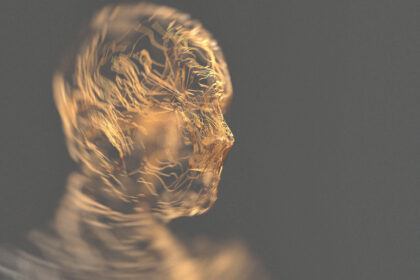 Rozświetlona głową osoby na czarnym tle,symbolizująca ból migrenowy i potrzebę ulgi