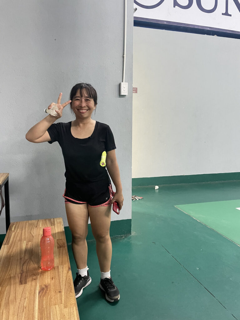 Mimi from Hoi An smiling after a badminton game